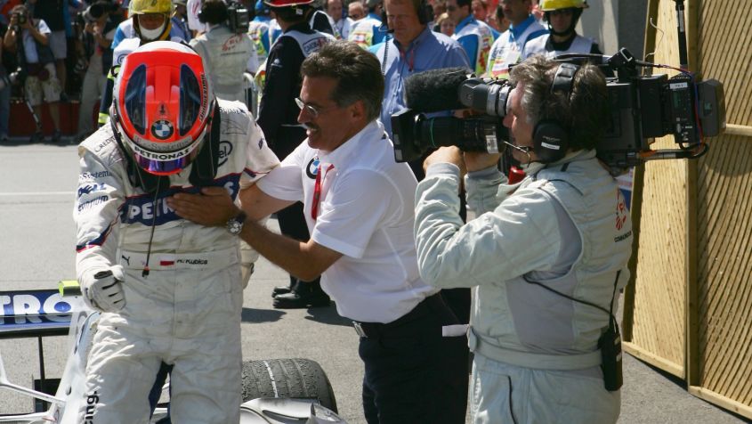 Robert Kubica (L) i Mario Theissen (fot. Getty Images)